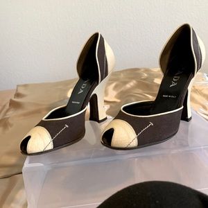 brand: prada, color: brown and cream or beige. used but in good condition